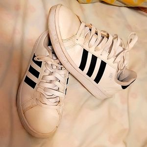 Classic Adidas white & black leather athletic shoes. Size 6